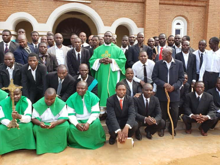 Bembeke CMO members with their parish priest