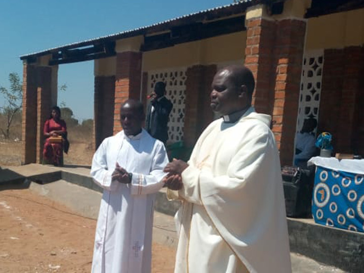 Fr Alfred Kalumbi hands over classroom block